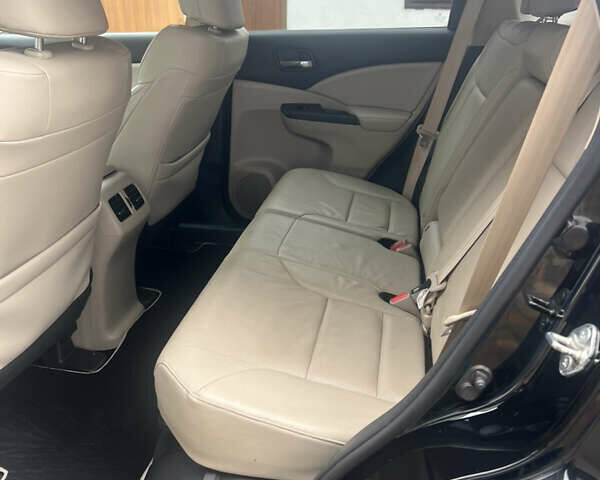 Черный Хонда СРВ, объемом двигателя 2.2 л и пробегом 225 тыс. км за 18000 $, фото 6 на Automoto.ua