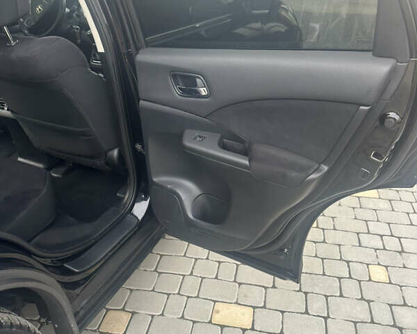 Хонда СРВ 2013 в Тысменице на Automoto.ua Черный Хонда СРВ, объемом двигателя 2.2 л и пробегом 275 тыс. км за 14600 $, фото 22 на Automoto.ua