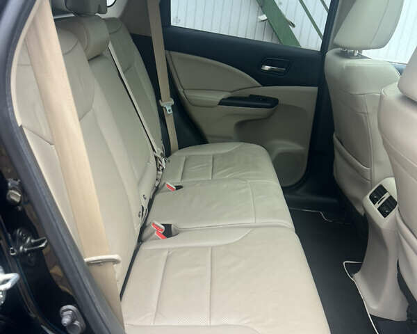 Черный Хонда СРВ, объемом двигателя 2.2 л и пробегом 225 тыс. км за 18000 $, фото 26 на Automoto.ua