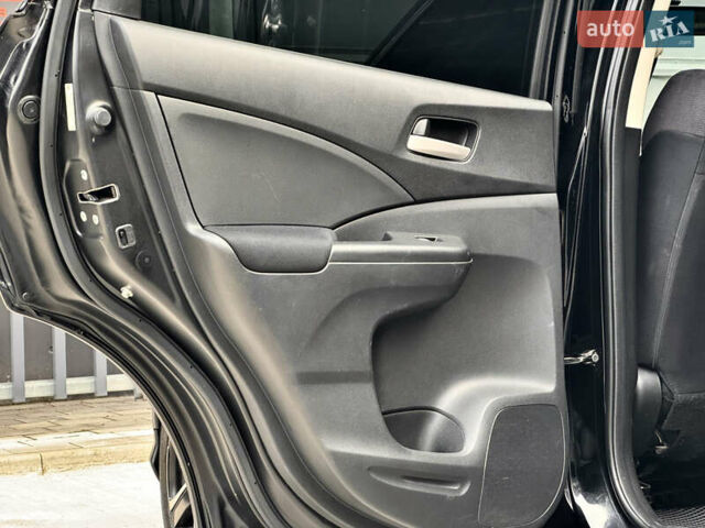 Хонда СРВ 2014 в Киеве на Automoto.ua Черный Хонда СРВ, объемом двигателя 2.4 л и пробегом 211 тыс. км за 14950 $, фото 23 на Automoto.ua