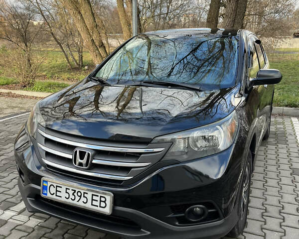 Черный Хонда СРВ, объемом двигателя 2.4 л и пробегом 197 тыс. км за 13500 $, фото 12 на Automoto.ua