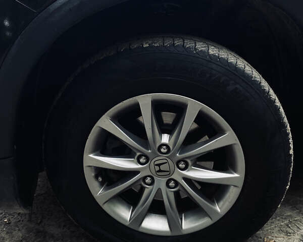 Хонда СРВ 2014 в Львове на Automoto.ua Черный Хонда СРВ, объемом двигателя 2.35 л и пробегом 167 тыс. км за 13990 $, фото 19 на Automoto.ua