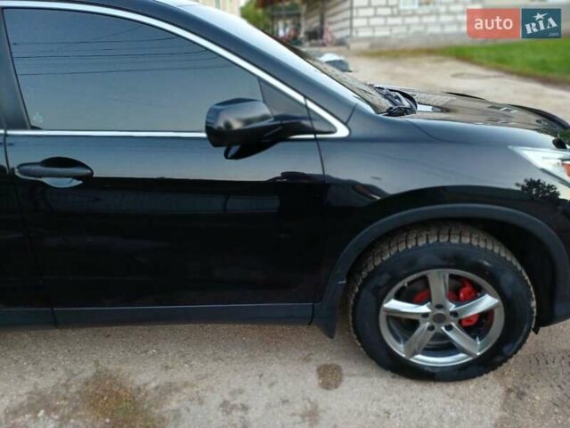 Черный Хонда СРВ, объемом двигателя 2.36 л и пробегом 204 тыс. км за 13200 $, фото 5 на Automoto.ua