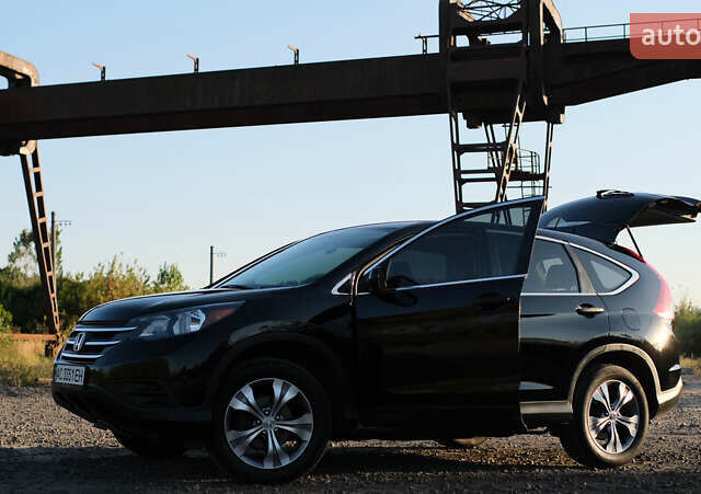 Черный Хонда СРВ, объемом двигателя 2.35 л и пробегом 160 тыс. км за 13900 $, фото 2 на Automoto.ua