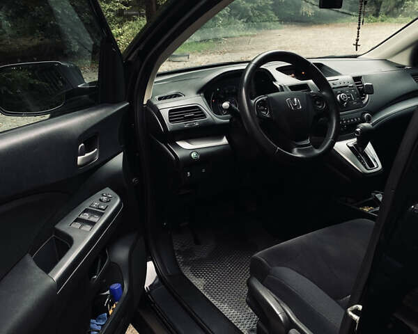 Хонда СРВ 2014 в Львове на Automoto.ua Черный Хонда СРВ, объемом двигателя 2.35 л и пробегом 167 тыс. км за 13990 $, фото 11 на Automoto.ua