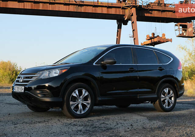 Черный Хонда СРВ, объемом двигателя 2.35 л и пробегом 160 тыс. км за 13900 $, фото 3 на Automoto.ua