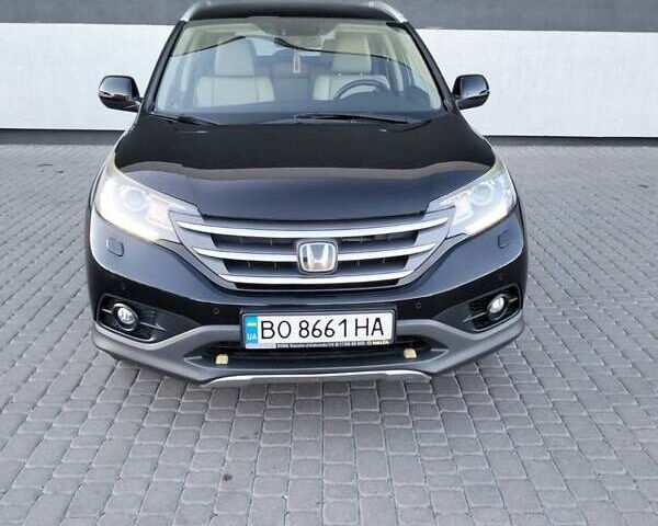 Хонда СРВ 2014 в Тернополе на Automoto.ua Черный Хонда СРВ, объемом двигателя 2.2 л и пробегом 255 тыс. км за 18850 $, фото 5 на Automoto.ua