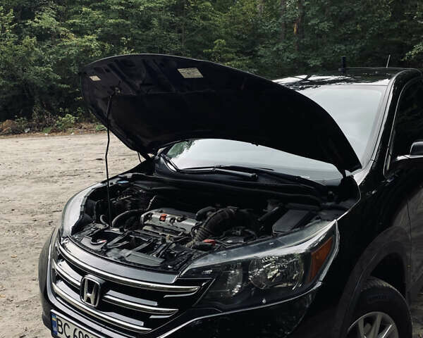Хонда СРВ 2014 в Львове на Automoto.ua Черный Хонда СРВ, объемом двигателя 2.35 л и пробегом 167 тыс. км за 13990 $, фото 17 на Automoto.ua