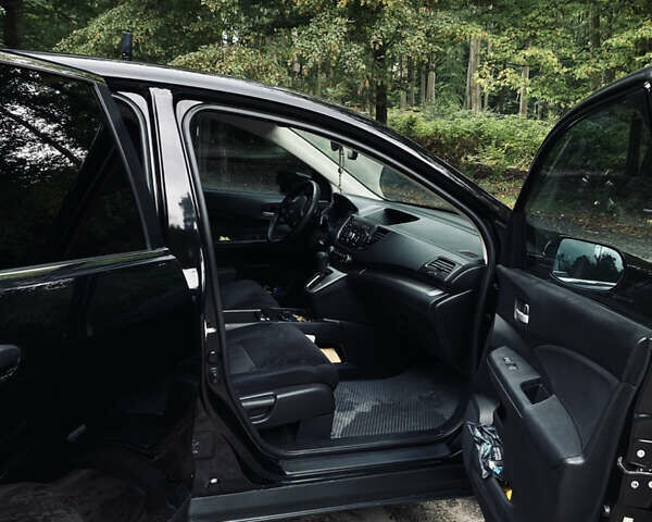 Хонда СРВ 2014 в Львове на Automoto.ua Черный Хонда СРВ, объемом двигателя 2.35 л и пробегом 167 тыс. км за 13990 $, фото 15 на Automoto.ua