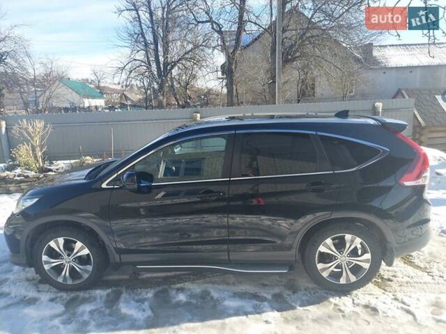 Черный Хонда СРВ, объемом двигателя 2.2 л и пробегом 250 тыс. км за 18000 $, фото 1 на Automoto.ua