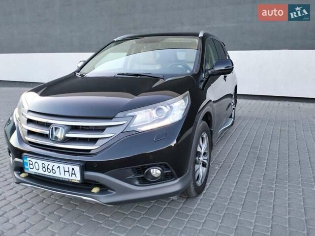Хонда СРВ 2014 в Тернополе на Automoto.ua Черный Хонда СРВ, объемом двигателя 2.2 л и пробегом 255 тыс. км за 18850 $, фото 13 на Automoto.ua