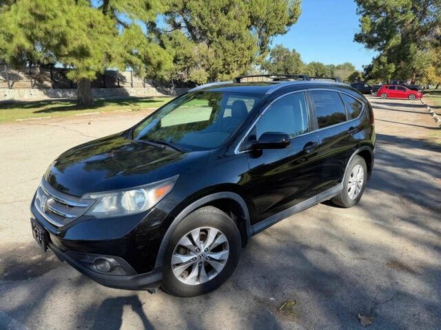 Черный Хонда СРВ, объемом двигателя 2.4 л и пробегом 86 тыс. км за 12500 $, фото 1 на Automoto.ua