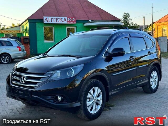 Черный Хонда СРВ, объемом двигателя 2.4 л и пробегом 148 тыс. км за 14380 $, фото 1 на Automoto.ua