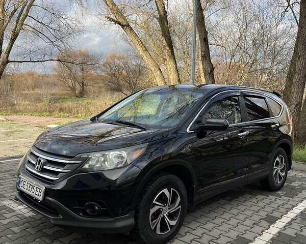 Черный Хонда СРВ, объемом двигателя 2.4 л и пробегом 197 тыс. км за 13500 $, фото 1 на Automoto.ua