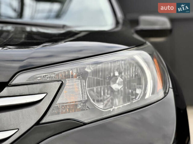 Хонда СРВ 2014 в Киеве на Automoto.ua Черный Хонда СРВ, объемом двигателя 2.4 л и пробегом 211 тыс. км за 14950 $, фото 11 на Automoto.ua