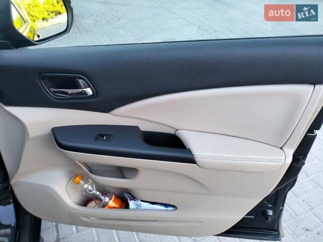 Хонда СРВ 2014 в Тернополе на Automoto.ua Черный Хонда СРВ, объемом двигателя 2.2 л и пробегом 255 тыс. км за 18850 $, фото 32 на Automoto.ua