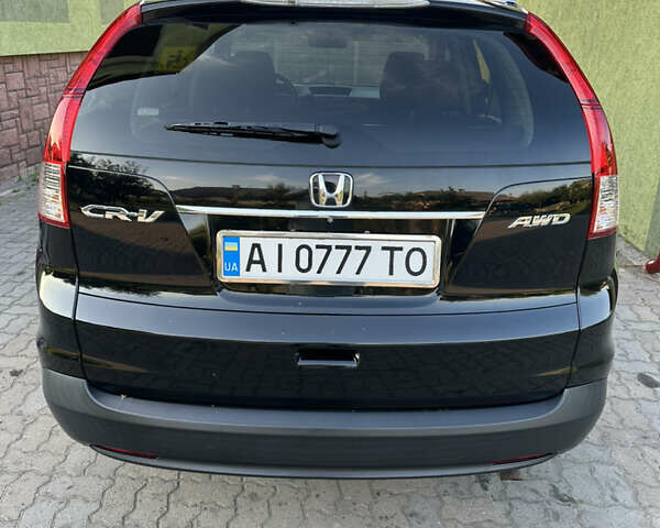 Хонда СРВ 2014 в Рава-Русская на Automoto.ua Черный Хонда СРВ, объемом двигателя 2.35 л и пробегом 214 тыс. км за 12800 $, фото 3 на Automoto.ua