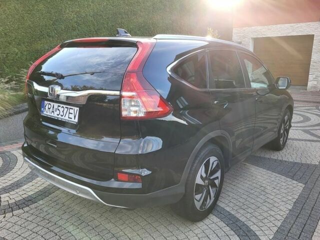 Черный Хонда СРВ, объемом двигателя 2 л и пробегом 141 тыс. км за 9800 $, фото 4 на Automoto.ua