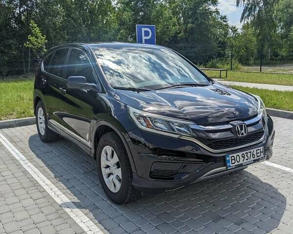 Черный Хонда СРВ, объемом двигателя 2.36 л и пробегом 205 тыс. км за 15700 $, фото 1 на Automoto.ua