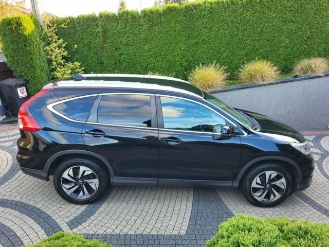 Черный Хонда СРВ, объемом двигателя 2 л и пробегом 141 тыс. км за 9800 $, фото 5 на Automoto.ua