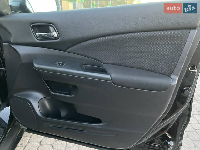 Черный Хонда СРВ, объемом двигателя 1.6 л и пробегом 204 тыс. км за 19300 $, фото 43 на Automoto.ua