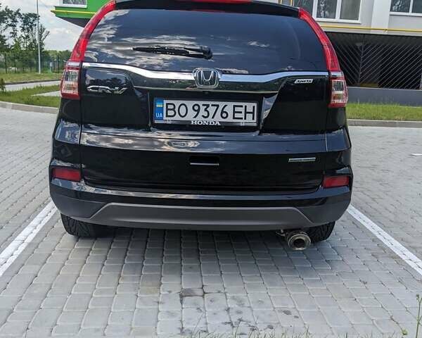 Черный Хонда СРВ, объемом двигателя 2.36 л и пробегом 205 тыс. км за 15700 $, фото 6 на Automoto.ua
