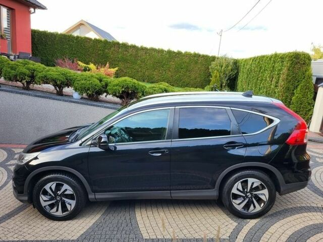 Черный Хонда СРВ, объемом двигателя 2 л и пробегом 141 тыс. км за 9800 $, фото 1 на Automoto.ua