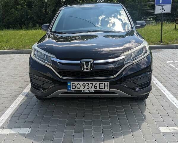 Черный Хонда СРВ, объемом двигателя 2.36 л и пробегом 205 тыс. км за 15700 $, фото 2 на Automoto.ua