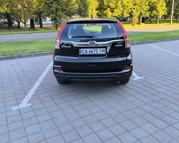 Черный Хонда СРВ, объемом двигателя 2.35 л и пробегом 126 тыс. км за 16200 $, фото 2 на Automoto.ua