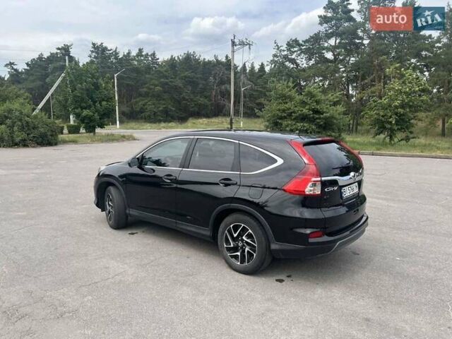 Черный Хонда СРВ, объемом двигателя 2.35 л и пробегом 190 тыс. км за 17000 $, фото 1 на Automoto.ua