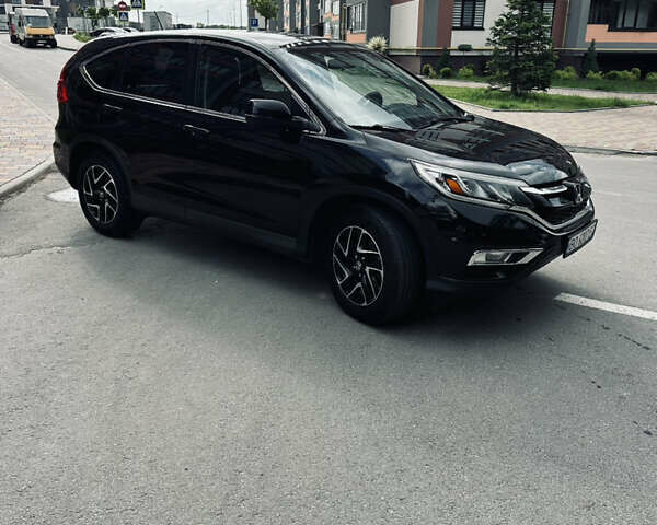 Черный Хонда СРВ, объемом двигателя 2.36 л и пробегом 160 тыс. км за 14500 $, фото 4 на Automoto.ua