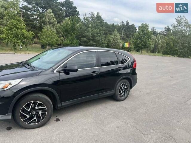 Черный Хонда СРВ, объемом двигателя 2.35 л и пробегом 190 тыс. км за 17000 $, фото 5 на Automoto.ua