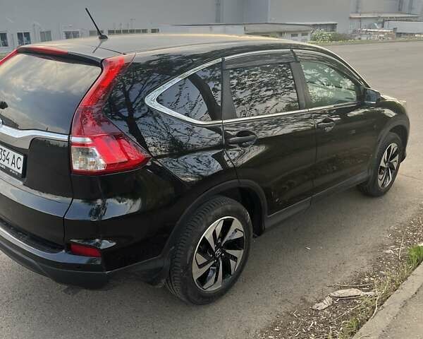 Черный Хонда СРВ, объемом двигателя 2.36 л и пробегом 171 тыс. км за 15500 $, фото 6 на Automoto.ua