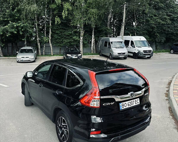 Черный Хонда СРВ, объемом двигателя 2.36 л и пробегом 160 тыс. км за 14500 $, фото 2 на Automoto.ua