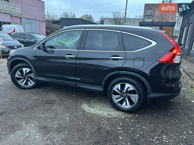 Чорний Хонда СРВ, об'ємом двигуна 2.4 л та пробігом 175 тис. км за 18500 $, фото 19 на Automoto.ua