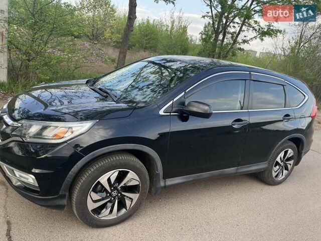 Черный Хонда СРВ, объемом двигателя 2.36 л и пробегом 171 тыс. км за 15500 $, фото 4 на Automoto.ua