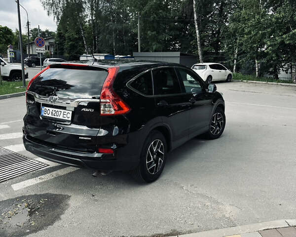 Черный Хонда СРВ, объемом двигателя 2.36 л и пробегом 160 тыс. км за 14500 $, фото 3 на Automoto.ua