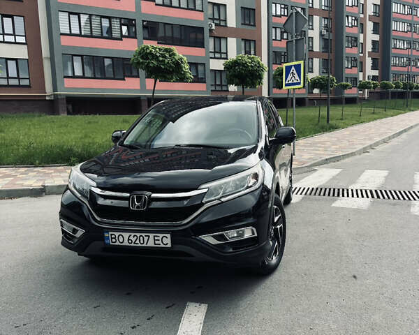 Черный Хонда СРВ, объемом двигателя 2.36 л и пробегом 160 тыс. км за 14500 $, фото 1 на Automoto.ua