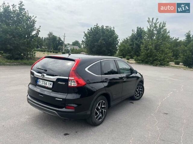 Черный Хонда СРВ, объемом двигателя 2.35 л и пробегом 190 тыс. км за 17000 $, фото 3 на Automoto.ua