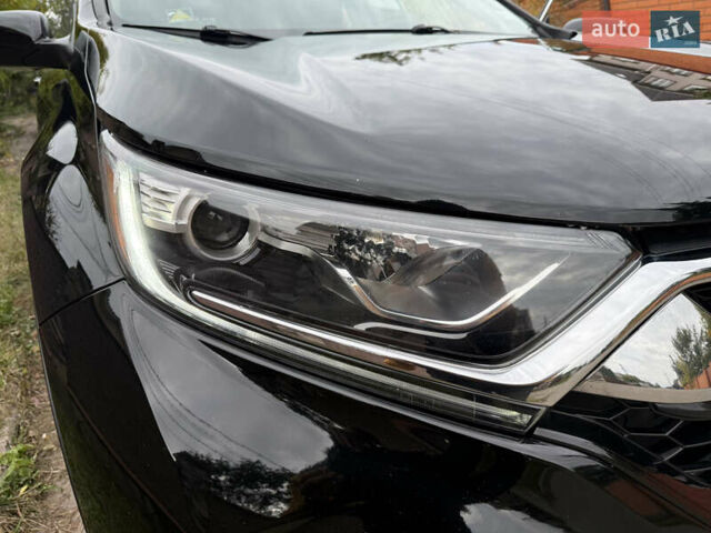 Черный Хонда СРВ, объемом двигателя 1.5 л и пробегом 142 тыс. км за 20100 $, фото 5 на Automoto.ua