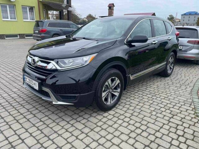 Черный Хонда СРВ, объемом двигателя 2.4 л и пробегом 134 тыс. км за 17000 $, фото 1 на Automoto.ua