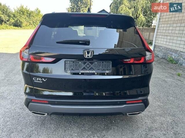 Чорний Хонда СРВ, об'ємом двигуна 2 л та пробігом 15 тис. км за 35500 $, фото 5 на Automoto.ua