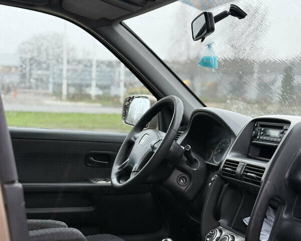 Коричневий Хонда СРВ, об'ємом двигуна 2 л та пробігом 299 тис. км за 5500 $, фото 6 на Automoto.ua