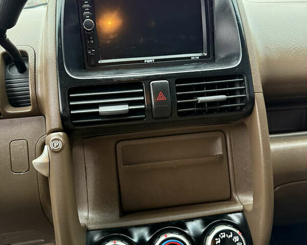 Коричневий Хонда СРВ, об'ємом двигуна 2.35 л та пробігом 294 тис. км за 6500 $, фото 10 на Automoto.ua