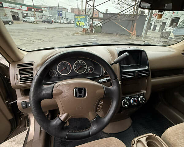 Коричневий Хонда СРВ, об'ємом двигуна 2.35 л та пробігом 294 тис. км за 6500 $, фото 9 на Automoto.ua