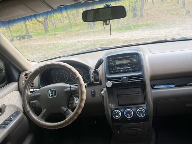 Коричневый Хонда СРВ, объемом двигателя 2 л и пробегом 427 тыс. км за 6700 $, фото 9 на Automoto.ua