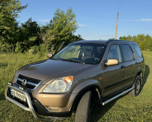 Коричневый Хонда СРВ, объемом двигателя 2 л и пробегом 364 тыс. км за 5700 $, фото 1 на Automoto.ua