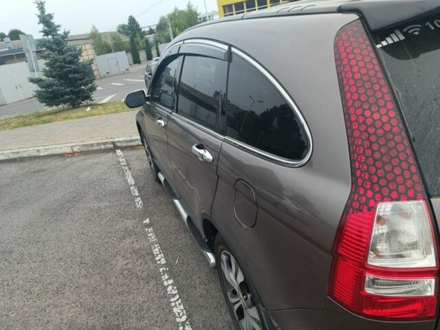 Коричневый Хонда СРВ, объемом двигателя 2.4 л и пробегом 330 тыс. км за 10300 $, фото 2 на Automoto.ua