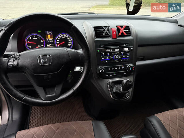 Коричневый Хонда СРВ, объемом двигателя 2.2 л и пробегом 187 тыс. км за 13000 $, фото 27 на Automoto.ua