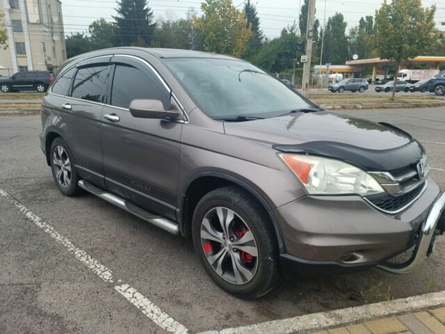 Коричневый Хонда СРВ, объемом двигателя 2.4 л и пробегом 330 тыс. км за 10300 $, фото 1 на Automoto.ua